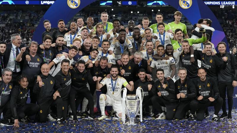 Real Madrid with the UEFA Champions League 2023-24 trophy