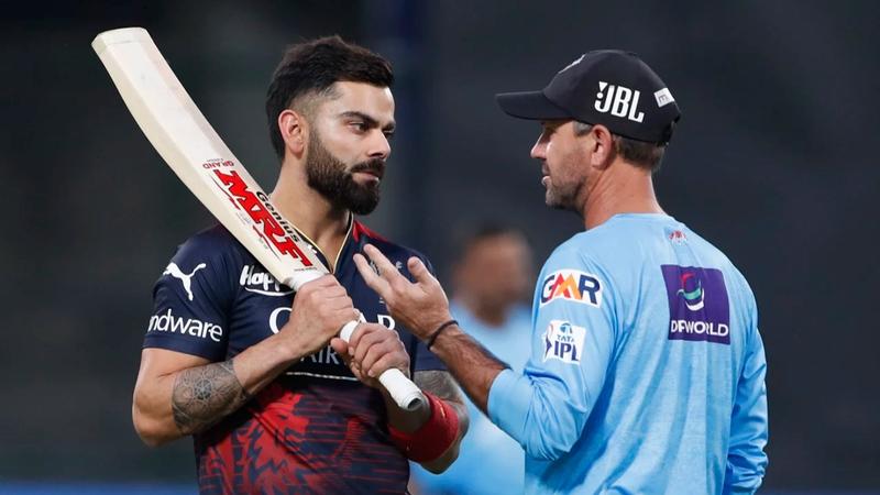 Ricky Ponting has a chat with Virat Kohli during the IPL