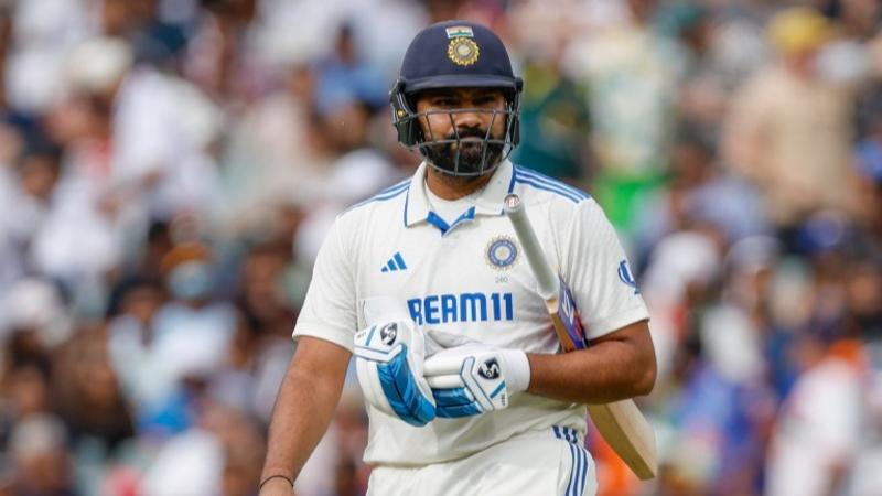 Rohit Sharma walks off after being dismissed in the Pink Ball Test match