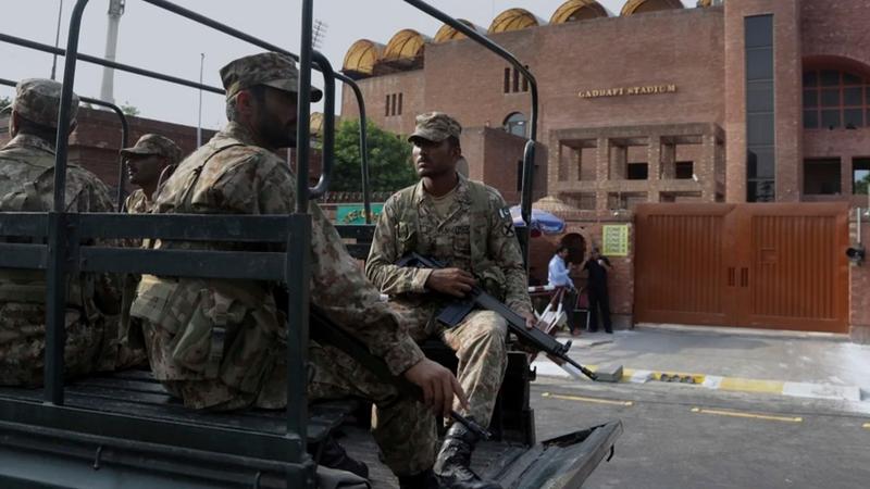 Security outside the Gaddafi stadium