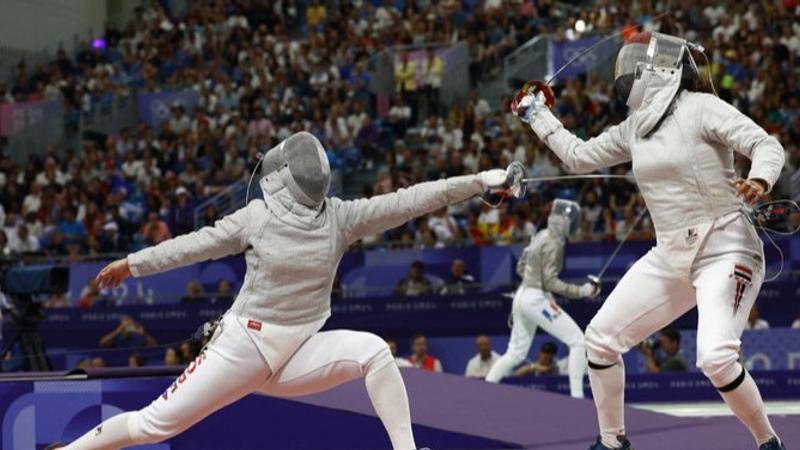 seven months pregnant Egyptian fencer Nada Hafez competing at paris Olympics