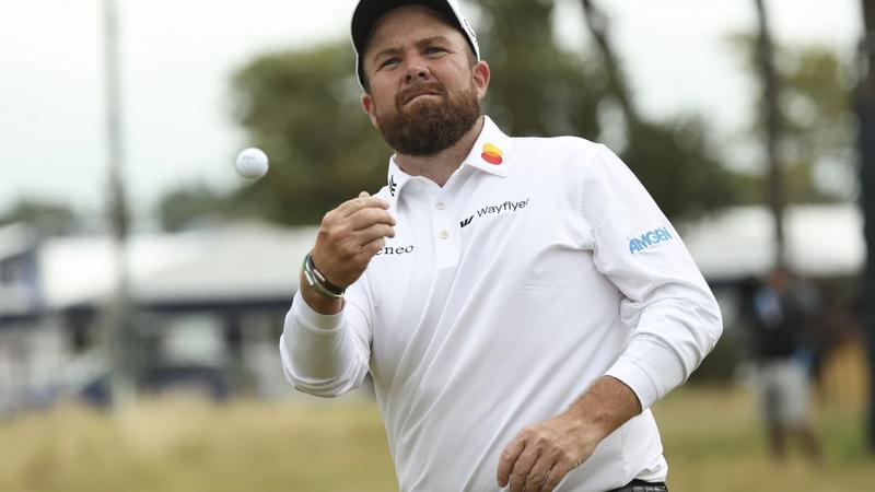 Shane Lowry throws the ball