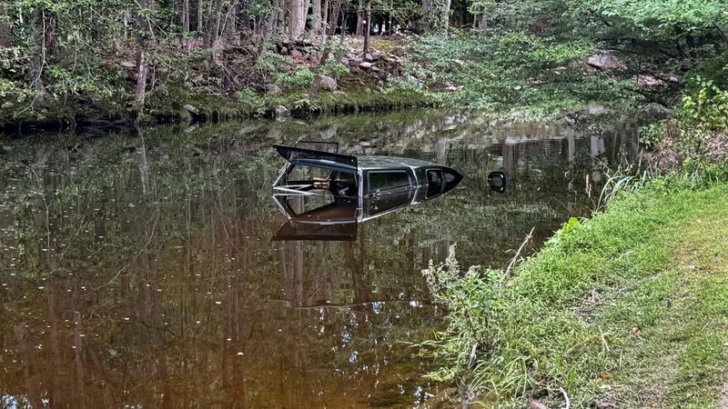 Submerged vehicle in the Aspetuck River, in Fairfield Connecticut