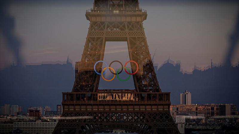 The Olympic rings are seen on the Eiffel Tower in Paris