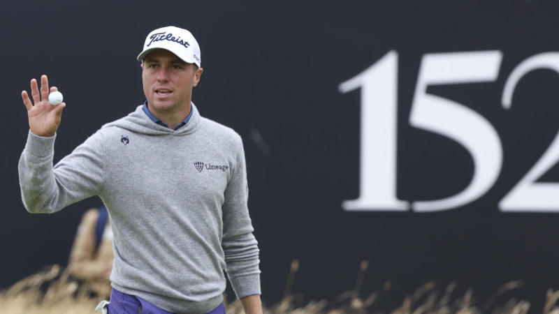 Thomas steadies himself in the wind and rain at Troon for early British Open lead