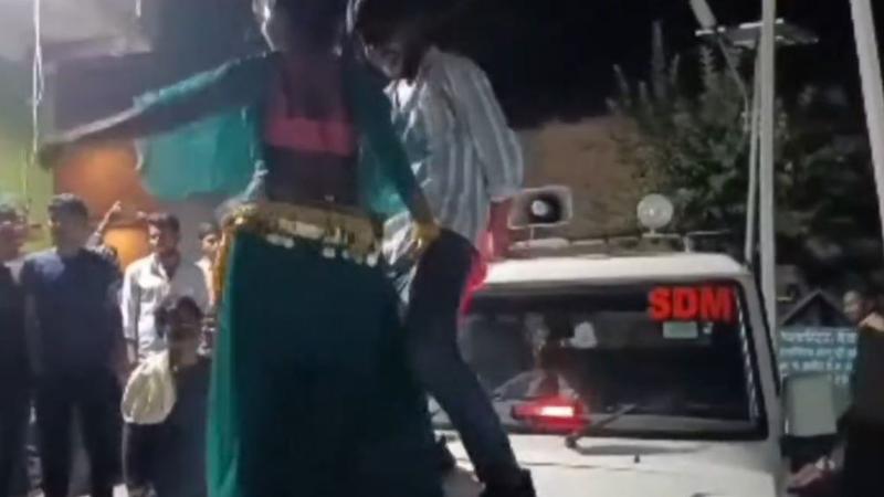 uttar pradesh jhansi bargirl danced sdm car bonnet