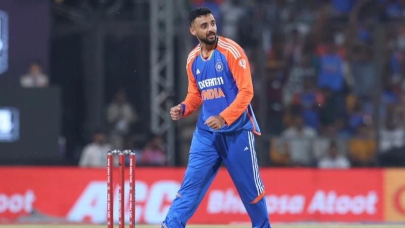 Varun Chakaravarthy celebrates after taking a wicket