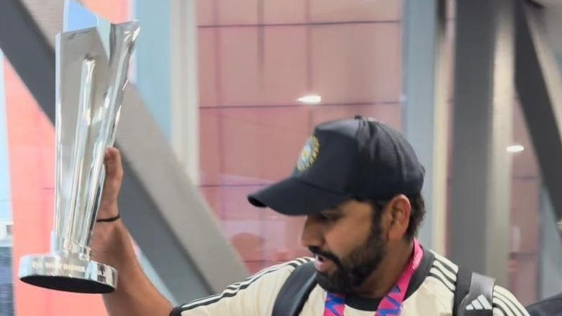 Rohit Sharma holding T20 World Cup trophy