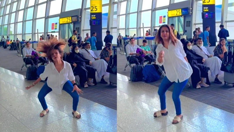 woman dances at kolkata airport