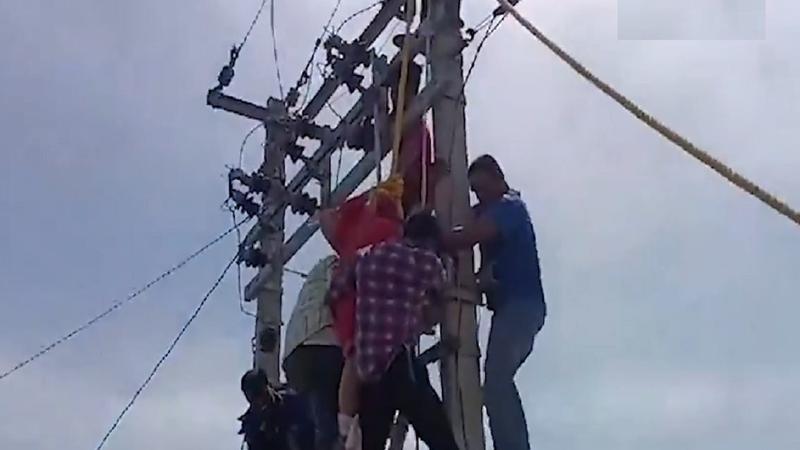 Women Clime on Pole