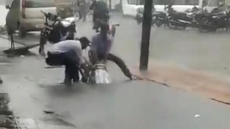 'Don't share fake videos': BMC clarifies that viral video of bike stuck in flooded manhole is not from Mumbai