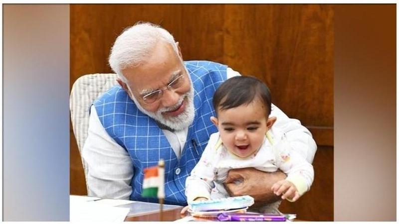 VIRAL: PM Modi shares pictures with 'special friend' in Parliament, takes internet by storm. Find out who the baby is here