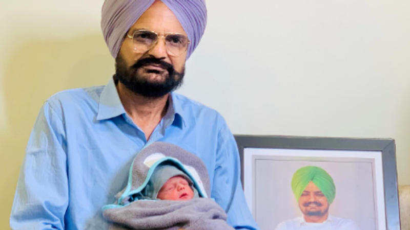 Sidhu Moose Wala's father with his newborn baby