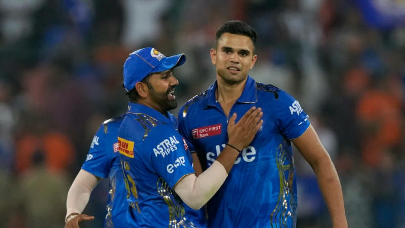 Arjun Tendulkar congratulated by Rohit Sharma