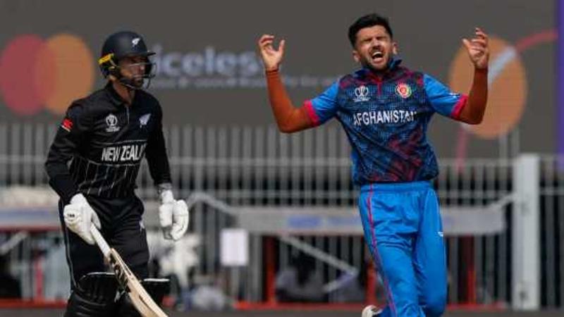 Fazalhaq Farooqi reacts during the match 