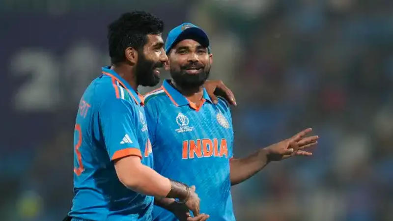 Indian pacer Jasprit Bumrah and Mohammad Shami during IND vs ENG CWC 2023 match