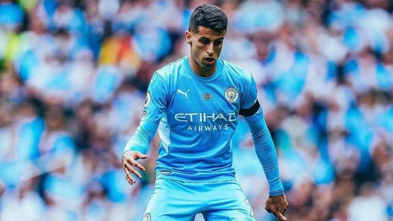 Manchester City defender Jaoa Cancelo saves young kid