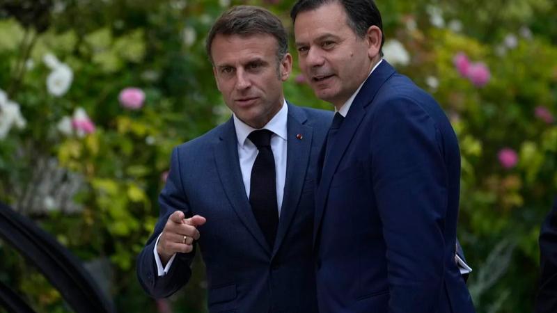 French President Emmanuel Macron, left, welcomes Portugal's Prime Minister Luís Montenegro 