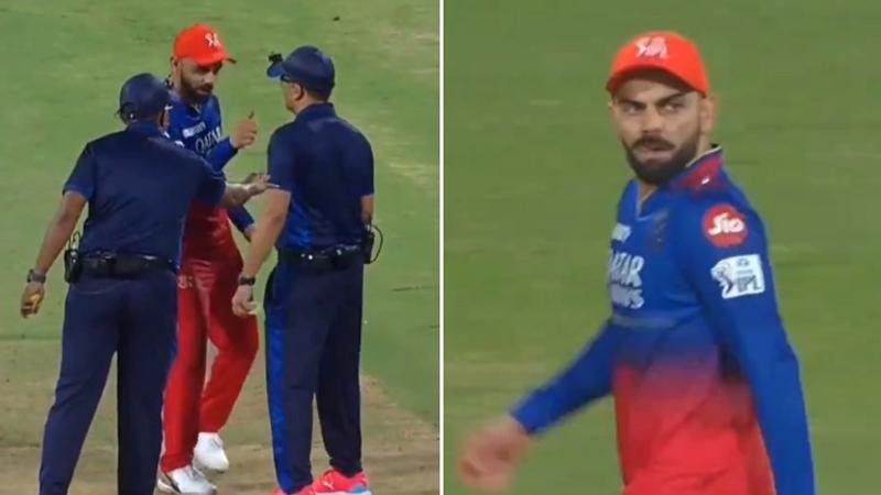 Virat Kohli speaking to umpires