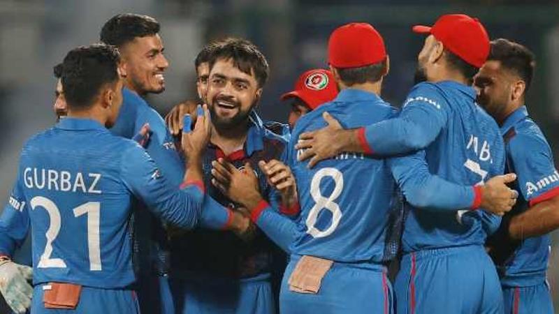 Rashid Khan celebrates with team after defeating England