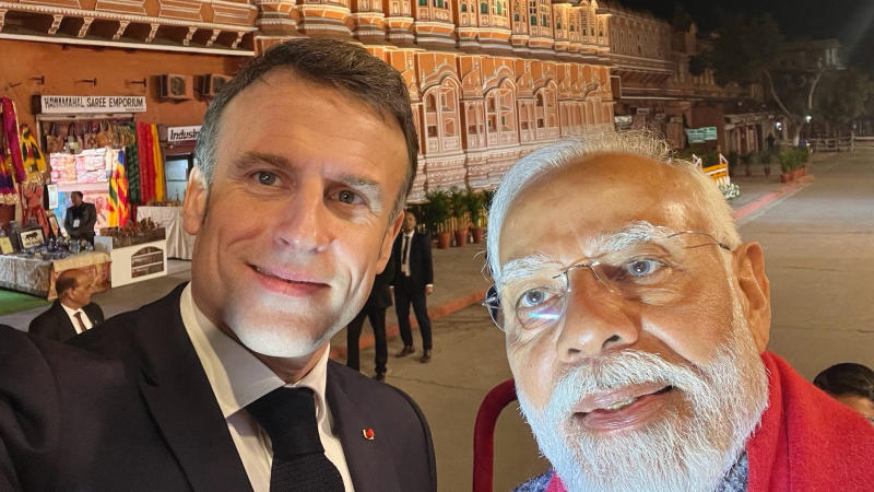French President Emmanuel Macron clicks selfie with PM Modi