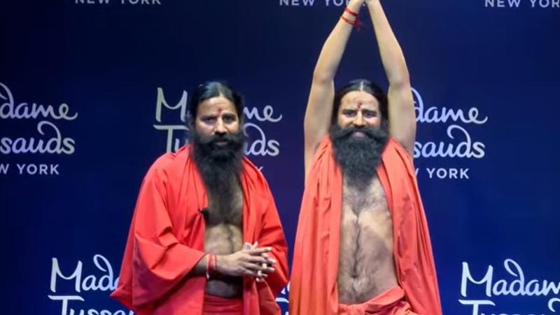 Baba Ramdev with his wax statue