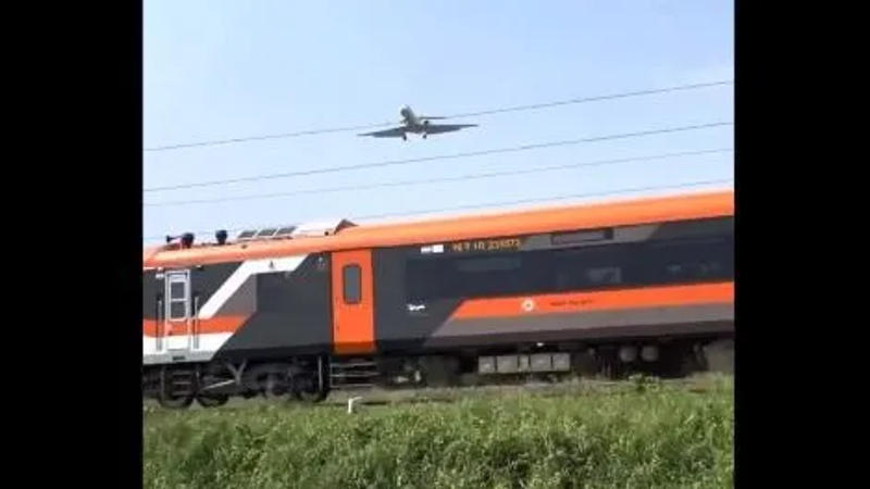 Vande Bharat Express Train And An Airplane in a single frame