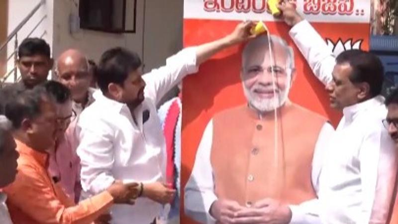 BJP Leaders Offer Milk to PM's Poster 