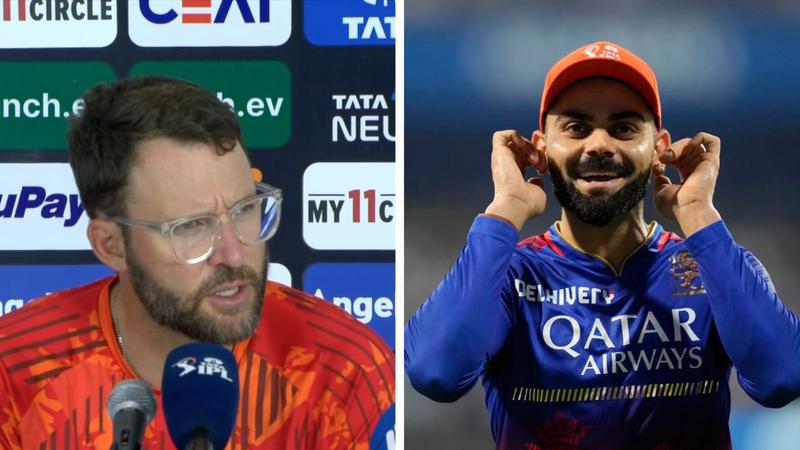 Daniel Vettori and Virat Kohli