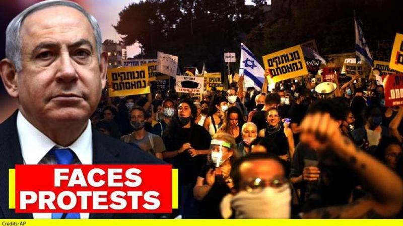 Israel's PM faces protests at Ben Gurion airport