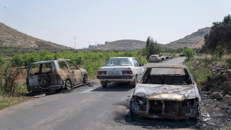 Several vehicles and houses were set on fire as Israeli settlers attacked the West Bank village of al-Mughayyir on Friday.  