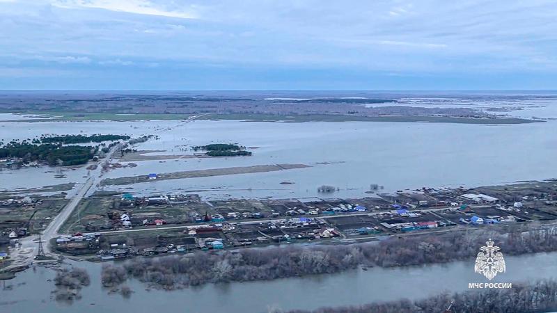Nearly 14,500 homes have been submerged in the Russian region bordering Kazakhstan.