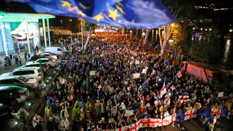 Thousands of Georgians are protesting against a bill that they say would endanger the nation's progress towards joining the EU. 