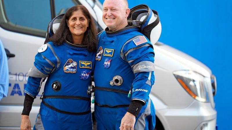 NASA astronauts Suni Williams, left, and Butch Wilmore pose for a photo after leaving the operations 
