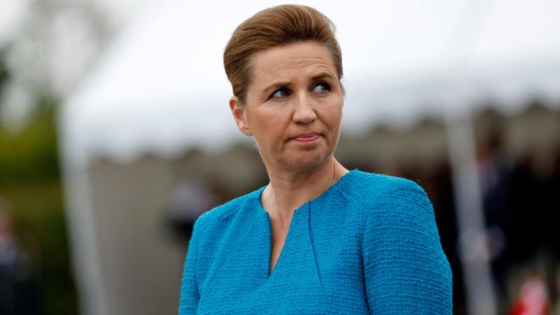 Denmark's Prime Minister Mette Frederiksen attends a ceremony at the Danish monument outside of Sainte Marie du Mont