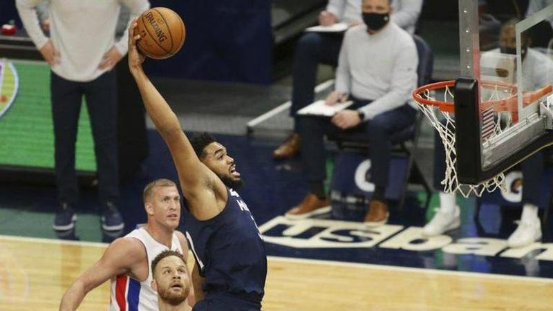 Beasley, Towns lead T-wolves rally past Pistons 111-101