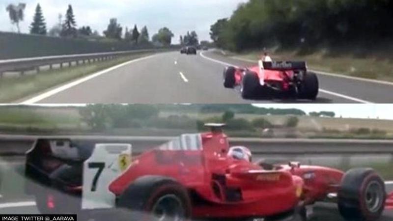 Ferrari driving on highway