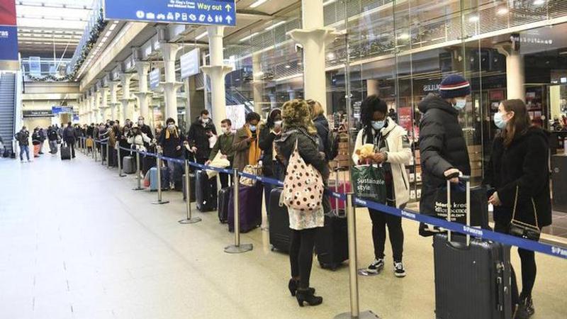 Millions face new UK virus restrictions; border chaos eases