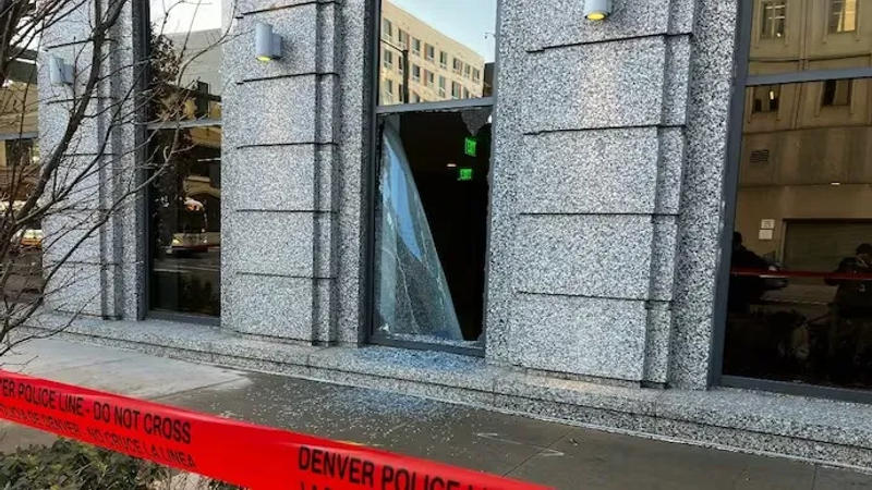 A man was arrested on Tuesday after he broke into the Colorado Supreme Court building in Denver with a handgun and lit a fire in a stairwell, police said.