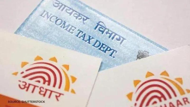 IMF hails aadhaar