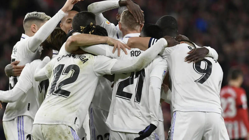 Real Madrid players celebrating a goal