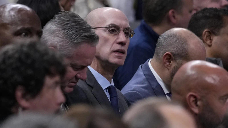 NBA Commissioner Adam Silver watches a game from the courtside