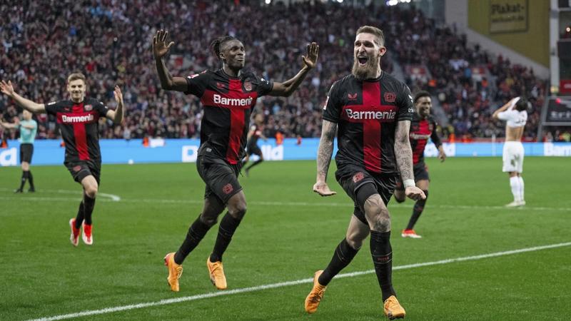 Bayer Leverkusen team celebrates scoring a goal