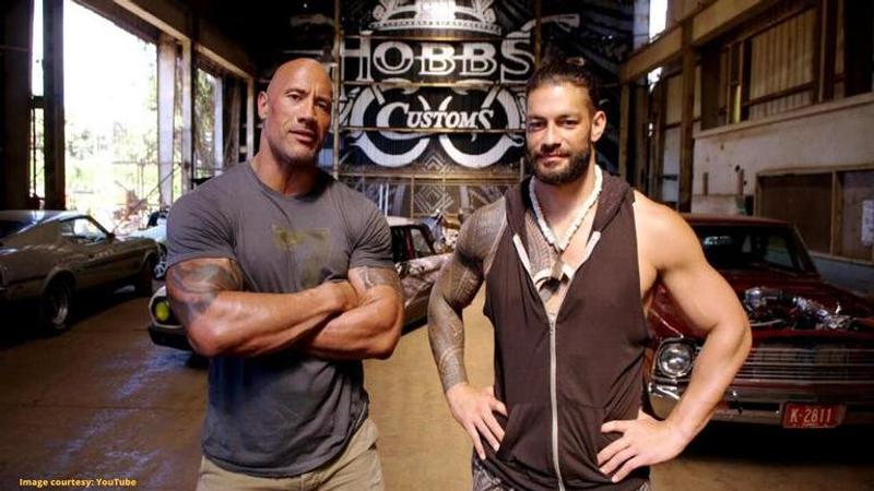 is roman reigns related to the rock