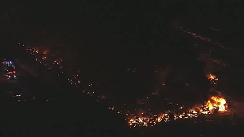 Massive Fire breaks out at an automobile salvage yard in Texas