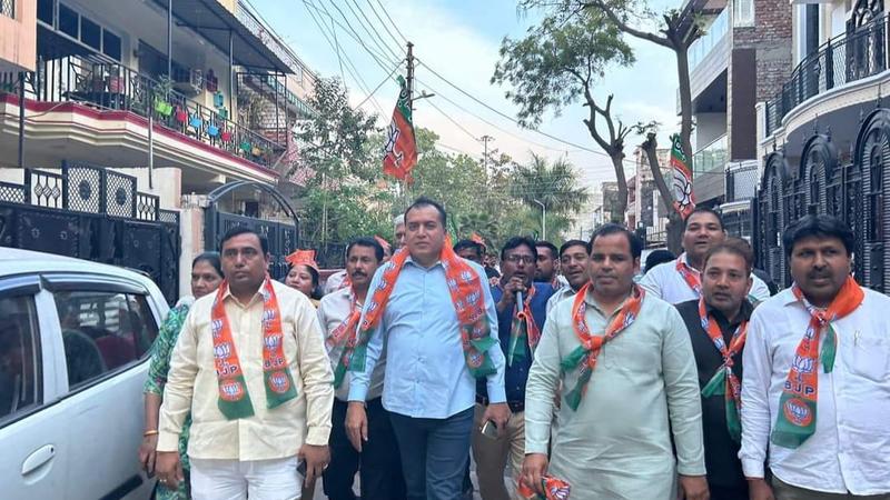 BJP's Noida unit chief Manoj Gupta with party workers