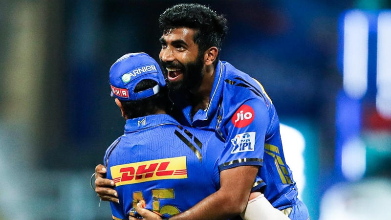 Jasprit Bumrah celebrates with Rohit Sharma