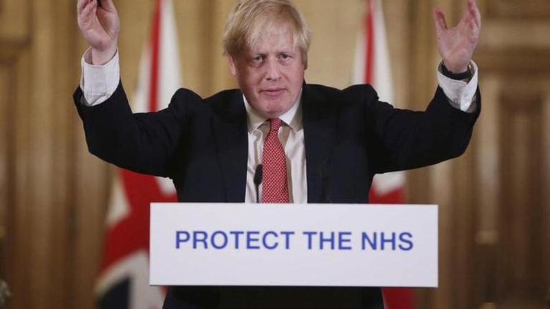 UK PM Boris Johnson returns to face growing virus divisions