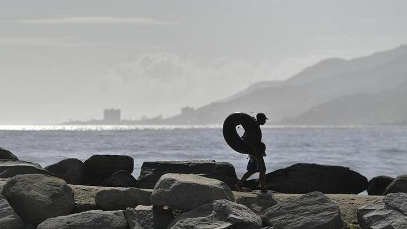 Venezuelans turn to high sea on tubes to fishing