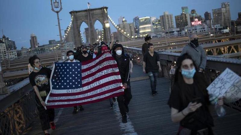 US protests calm after arrests, clashes with cops